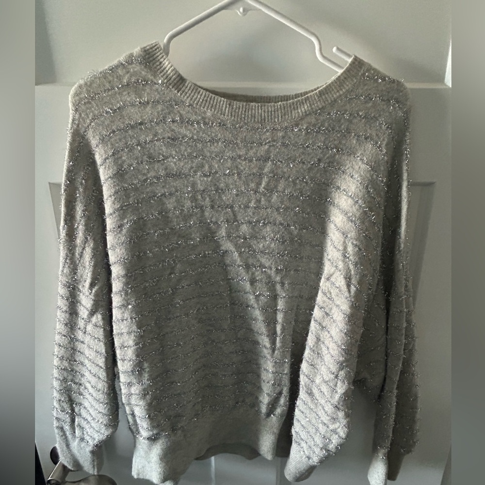 Women's gray sweater with silver stripes. Size medium.